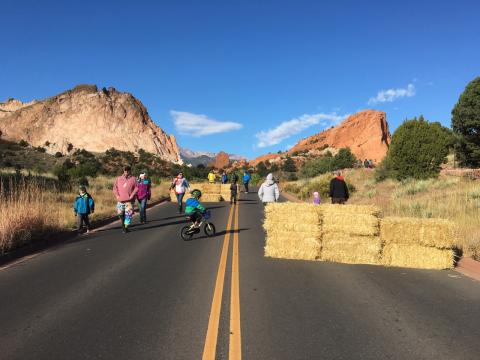 Hay bales are placed in the road at Garden of the Gods for the last Motorless Morning event in the park.