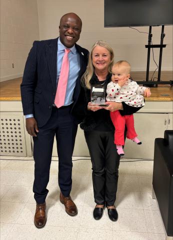 Mayor Yemi and Cindy Aubrey take a picture together after the presentation of her Spirit of the Springs award