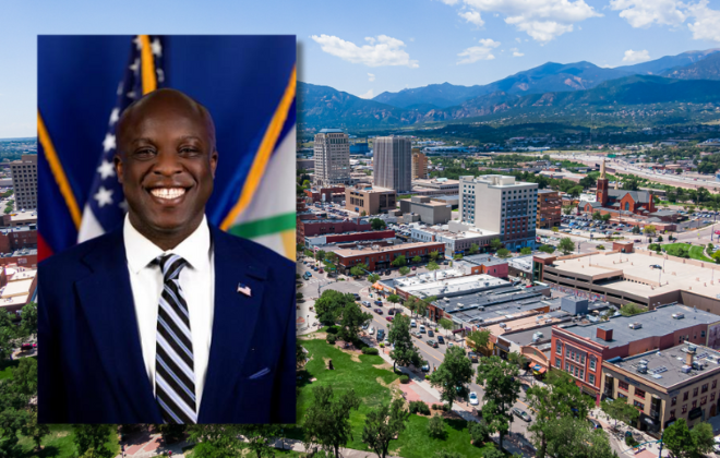 Portrait of Mayor Yemi overlayed on a photo of downtown Colorado Springs